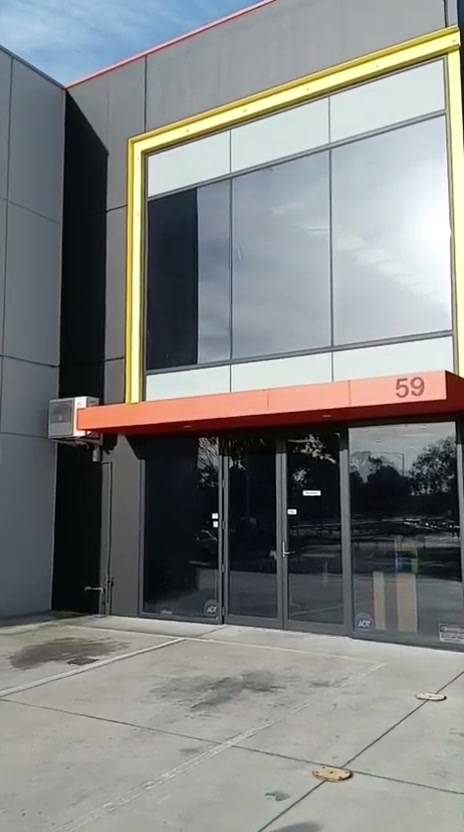 Factory entrance with the number 59 above the doors
